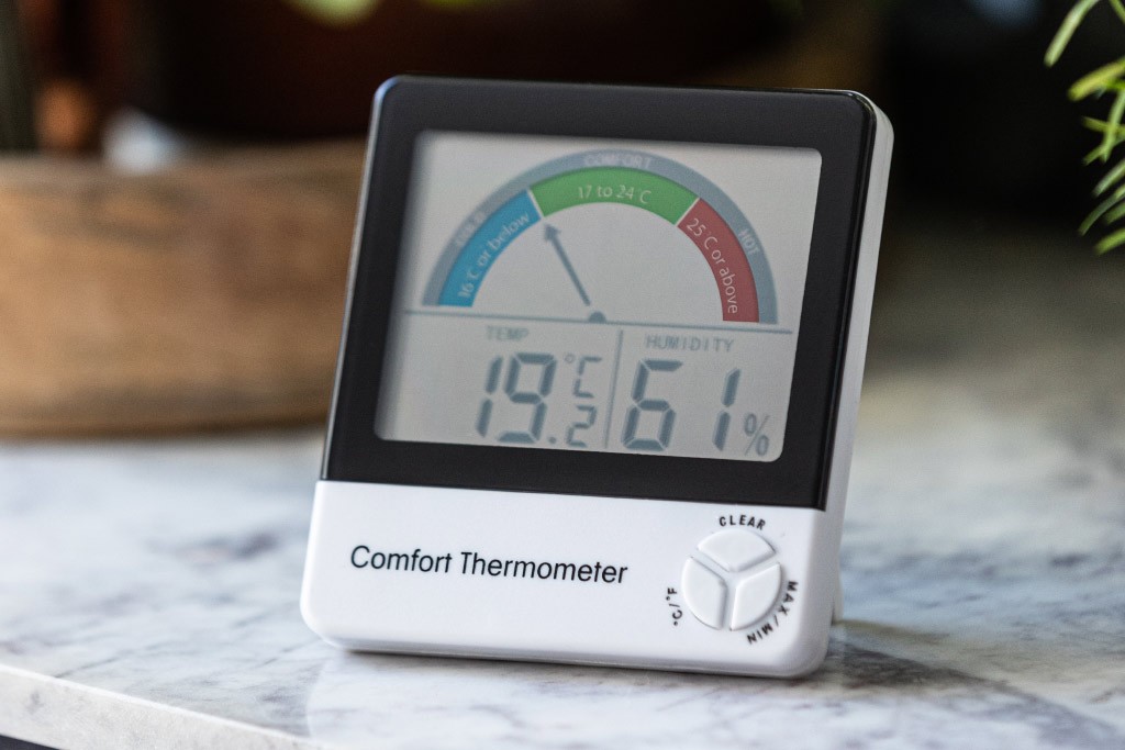Comfort thermometer sitting on marble countertop