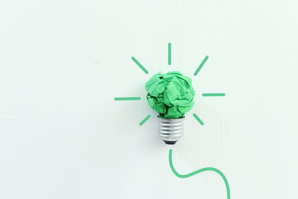 Lightbulb with glass replaced by green, scrunched up paper